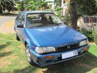 Mazda 323 for sale in Botswana - 1